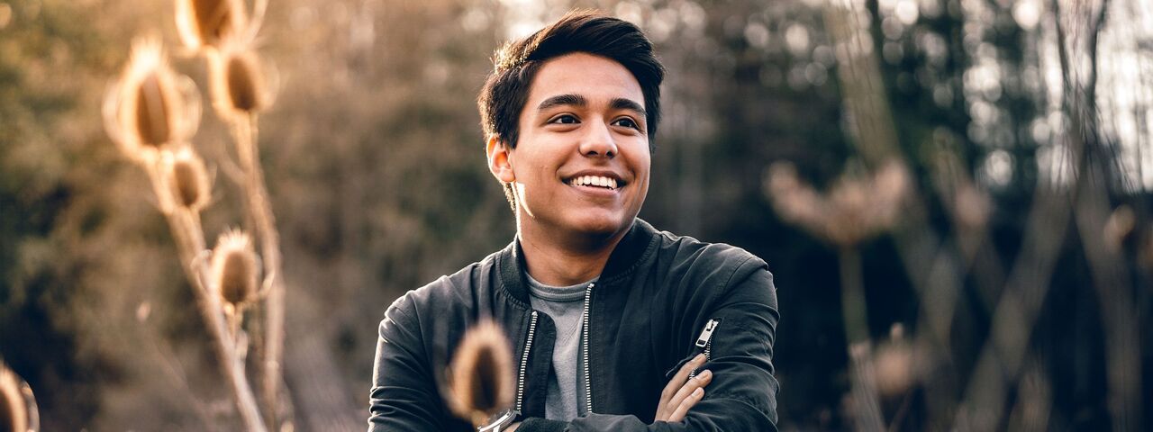 Man smiling wearing contact lenses